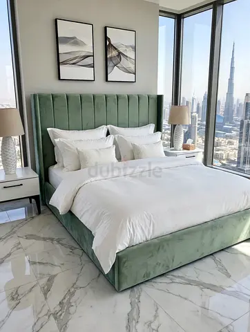 Green velvet upholstered king bed with tall channel-tufted headboard