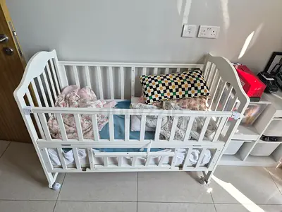 White Wooden Baby Crib with Wheels — Good Condition