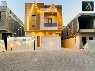 Corner villa for sale in Ajman, Al Helio 2 area. 3 bedrooms, majlis, living room, maid's room and storage. Freehold ownership for all nationalities. P