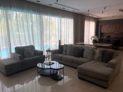 Large L-shaped grey fabric sofa set with armchair and ottoman - excellent condition - Ashleys