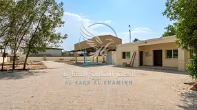 Yard for Rent in Al Sajaa – 20,000 Sq Ft with Covered Shed