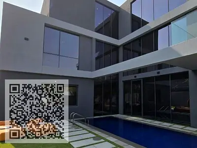4-Bedroom Villa with a Private Pool, surrounded by lush green landscapes in Masaar Sharjah.