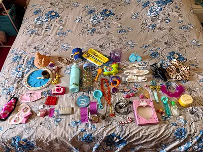 All for 10 aed Randon kids toys and items for girls mainly Location Al barsha 1