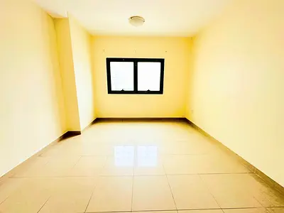 Family building covered parking free Spacious 1bhk with 2 full bathrooms just in 42k in Al nahda sh