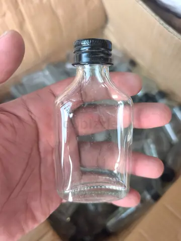 Small Glass Bottles with Black Caps