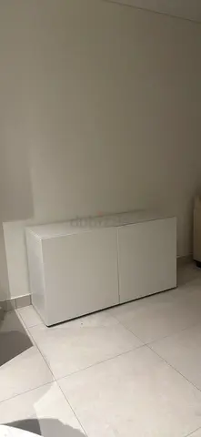 White modern 2-door storage / tv cabinet including additional glass top - good condition