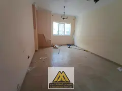 Two-bedroom apartment for annual rent in Al Hamidiya 1, Ajman | Master bedroom and built-in wardrobe