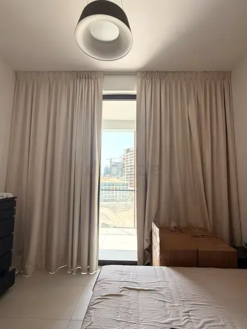 Light beige curtain panel — good condition, double panel