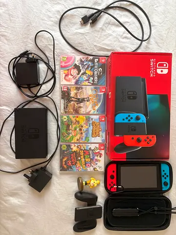 Nintendo Switch Console Bundle with 4 Games, Dock, Joy-Cons and Accessories