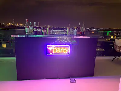 Portable Outdoor Bar Counter with Neon 'Party' Sign.12 Pcs/5000 Each