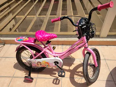 Pink Kids Bicycle with Training Wheels and Basket - Good Condition