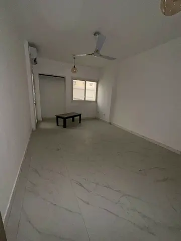 Cheapest 3BR Apartment for Annual Rent in Al Majaz 2, Sharjah. Fully renovated, spacious hall, 2 baths, balcony with open view & split AC.