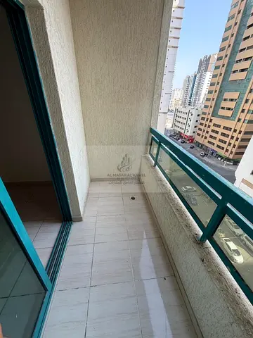 1-Bedroom Apartment for Annual Rent in Al Qasimia Behind Mashreq Bank with Balcony, One Free Month, Free Maintenance & Flexible Payment Options