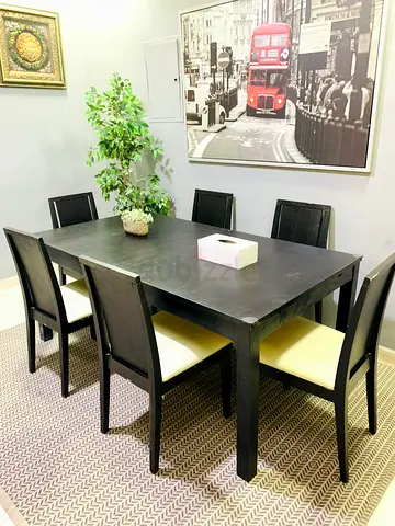 Solid Black Wooden Dining Table with 6 Chairs - Good Condition