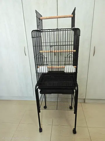 Large black metal bird cage on stand with perches & wheels. Cage cover, disposable bottom tray liner