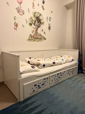 IKEA children’s bed with a trundle bed