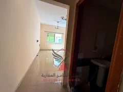 Spacious 1 Bedroom Apartment with American Kitchen for Annual Rent in Al Qasimia Al Nad