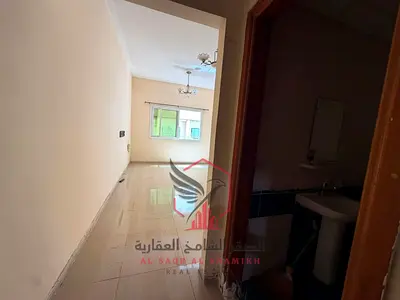 Spacious 1 Bedroom Apartment with American Kitchen for Annual Rent in Al Qasimia Al Nad