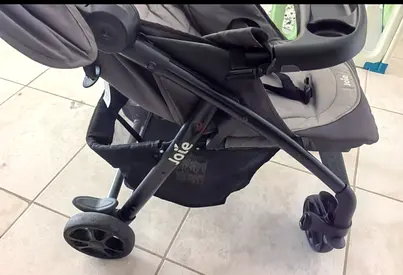 Lightweight grey standard stroller with tray and cup holders - good condition