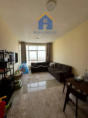 One-bedroom apartment with a living room in Al Nahda