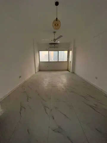 3BR Apartment for Annual Rent in Al Majaz 2, Sharjah. Fully renovated building, spacious hall, 2 bathrooms, balcony with open view & split AC.