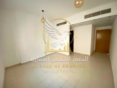 شقه غرفه وصاله اطلاله مفتوحه منطقه القليعه الشارقه صيانه مجانيه تكييف مركزي تامين مؤجل باركن رملي متوفر