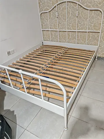 White metal double bed frame with slatted base (no mattress)