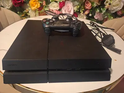 Sony PlayStation 4 console with controller and cables - good working condition 1 tb few times used