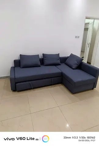 IKEA L shap Sofa store cum bed you can fix the storage lift or Right any side you want is available