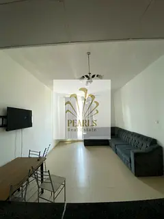 Furnished 1-bedroom apartment in City Tower, Al Nuaimiya 3, opposite Grand Mall. Open view, master b