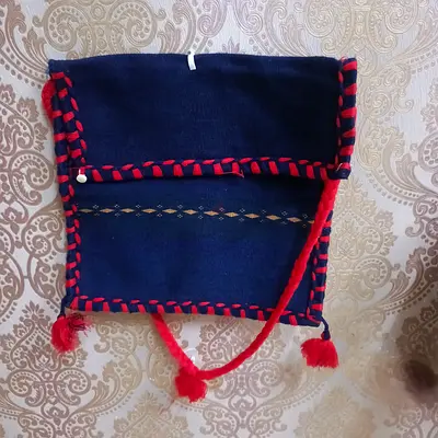Handmade Navy Blue Woolen Shoulder Bag with Red Trim and Tassels