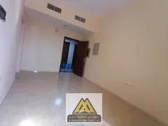 For annual rent in Al Alia, Ajman: 1BR, 2 bathrooms, central AC, free maintenance, AED 25K, 4 paymen