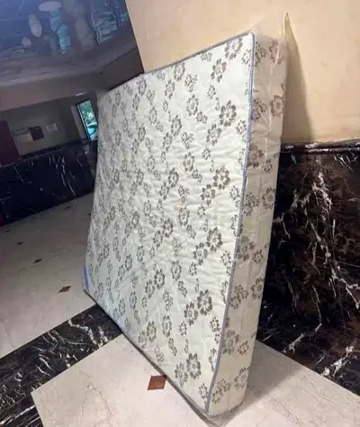 New double mattress in good condition - floral pattern