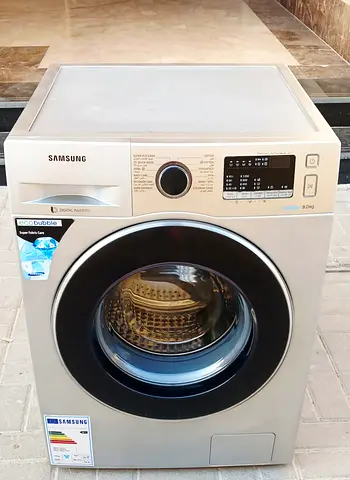 Samsung 8kg washing machine with eco bubble technology. silver color. perfectly working condition.