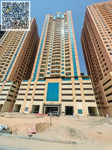 One-bedroom apartment with a living room for annual rent in the Al Amera area (Emirates Towers). Price: 30,000 (parking included).