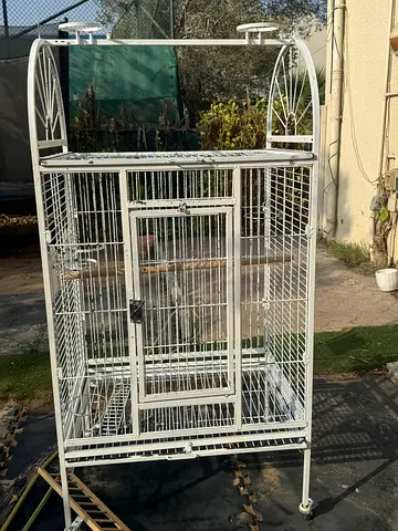 Large white metal bird cage on stand — good condition