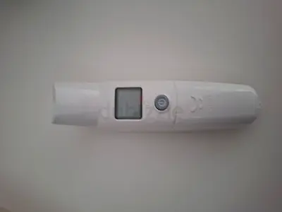 Digital infrared forehead thermometer - compact, lightly used