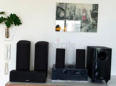 Onkyo 7.1 channel amplifier along with Dolby Atmos Onkyo speakers.Models SKR-594.