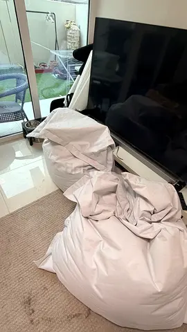 Pair of comfortable light white bean bags