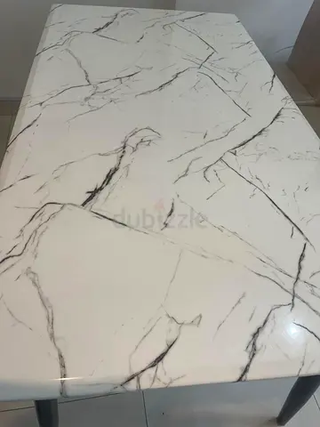 White marble-effect dining/console table with black veining