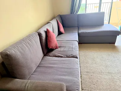 Large L-Shape Gray Sofa – Seats 8–10 | Washable Covers | AED 290