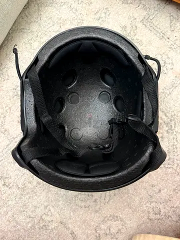 Used black bicycle/skate helmet in good condition