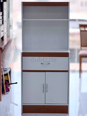 White and wood kitchen storage cabinet with shelves and drawer