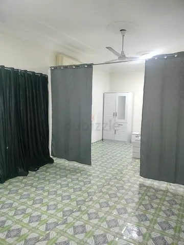 SPACIOUS BEDROOM WITH ATTACHED WASHROOM & KITCHEN AVAILABLE IN A SAFE, SECURE VILLA AT AL RASHIDIYA