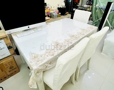 Ikea White Dining Table with 4 Matching Chairs. Table can be extended to 6