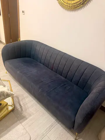 Blue velvet 2-seater sofa , 3 coffee tables and 2 chairs in good condition