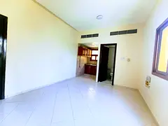 Separate kitchen studio adjacent to road near Lulu hypermarket with central AC