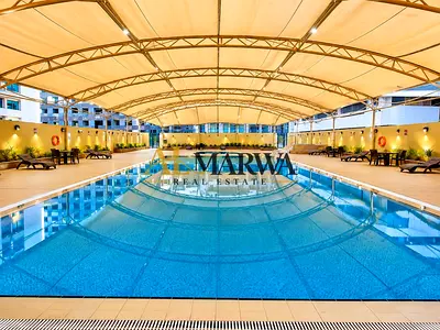 Premium 2BR + Maid’s Room | A/C Free | Gym, Pool & Kids Area | Prime Location Near Sahara Mall