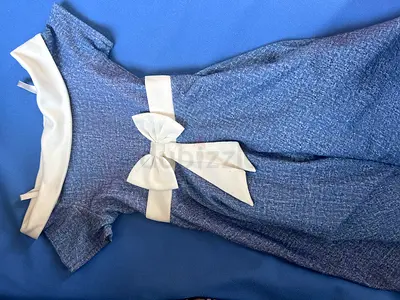 Blue girls' dress with white bow - gently used