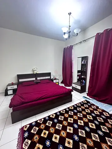 Dark wood kingsize bed with bedside tables and dressing - normal condition